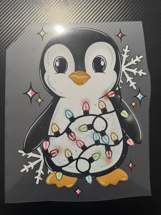 Penguin with Christmas lights glitter